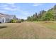 Expansive backyard offering plenty of space for outdoor activities and enjoying the natural surroundings at 440 Four Seasons Blvd, Summerville, SC 29486