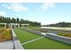 Enjoy a friendly game of bocce ball on this meticulously maintained court at 440 Four Seasons Blvd, Summerville, SC 29486