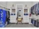 Walk in closet with white shelving, plenty of storage, and a mirror at 440 Four Seasons Blvd, Summerville, SC 29486