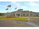 Community clubhouse boasting classic architecture, verdant landscaping, and welcoming entrance at 440 Four Seasons Blvd, Summerville, SC 29486