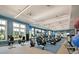 State-of-the-art fitness center with various exercise equipment and large windows for natural light at 440 Four Seasons Blvd, Summerville, SC 29486
