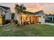 Charming single-Gathering home with stone accents, a well-manicured lawn, and a cozy front porch at 440 Four Seasons Blvd, Summerville, SC 29486
