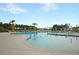 Community swimming pool featuring several lounge chairs and clear blue water on a sunny day at 440 Four Seasons Blvd, Summerville, SC 29486