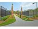 Scenic walkway between multiple tennis courts perfect for an active lifestyle at 440 Four Seasons Blvd, Summerville, SC 29486