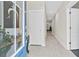 Inviting entryway with tiled flooring, a sleek door, and a glimpse into the home's stylish interior at 4429 Avery Ave, North Charleston, SC 29405