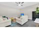 Relaxing living area with comfortable seating, a ceiling fan, and a cozy atmosphere for entertainment at 4429 Avery Ave, North Charleston, SC 29405