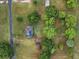 An aerial view of the home shows solar panels, a detached garage and shed on a landscaped lot at 449 Mary Lou Ln, Moncks Corner, SC 29461