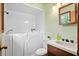Well-maintained bathroom with a walk-in tub, modern fixtures, vanity, and neutral color palette at 449 Mary Lou Ln, Moncks Corner, SC 29461