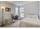 Serene bedroom with a study desk, comfortable bed, and windows offering natural light at 45 Sycamore Ave # 1532, Charleston, SC 29407