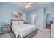 Serene main bedroom featuring neutral décor, a ceiling fan, and an ensuite bathroom at 45 Sycamore Ave # 1532, Charleston, SC 29407