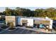 Aerial view of commercial retail spaces with varied facades and ample parking at 462 Maple Oak Ln, Charleston, SC 29414