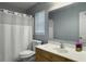 Bright bathroom with a neutral vanity, tile flooring and shower at 462 Maple Oak Ln, Charleston, SC 29414