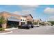 Commercial parking lot with parked cars in front of retail storefronts and gray awnings at 462 Maple Oak Ln, Charleston, SC 29414