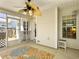 Charming screened-in porch featuring a ceiling fan and stylish floral rug, perfect for outdoor enjoyment at 462 Maple Oak Ln, Charleston, SC 29414