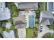 A luxurious home with a private pool, spa, stone patio, lush landscaping, and detached two car garage at 509 Gilberts Lndg, Mount Pleasant, SC 29464
