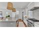 Spacious kitchen island features marble counters, seating, and stainless steel appliances at 509 Gilberts Lndg, Mount Pleasant, SC 29464
