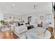 Spacious living room with hardwood floors, stylish seating, and open layout, perfect for modern living and entertaining at 509 Gilberts Lndg, Mount Pleasant, SC 29464