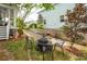 Backyard featuring a fire pit, grill, and plenty of space for outdoor entertaining at 5153 Celtic Dr, North Charleston, SC 29405