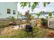 Backyard featuring a fire pit, grill, and plenty of space for outdoor entertaining at 5153 Celtic Dr, North Charleston, SC 29405