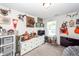 Inviting bedroom featuring deer mounts, built-in storage, and a flat screen TV at 5153 Celtic Dr, North Charleston, SC 29405