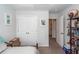 Functional bedroom with white doors, carpeted floors, and closet, all creating a cozy and practical space at 5153 Celtic Dr, North Charleston, SC 29405