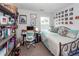 Inviting bedroom with bed, desk, work chair, bookshelf and decorations at 5153 Celtic Dr, North Charleston, SC 29405