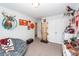 Well lit bedroom with a springwall machine, and decorative animal mounts at 5153 Celtic Dr, North Charleston, SC 29405