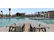 Community pool with sun loungers, umbrellas, and well maintained pool area at 534 Four Seasons Blvd, Summerville, SC 29486