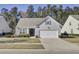 Charming one-story home featuring an attached garage and well-kept landscaping at 534 Four Seasons Blvd, Summerville, SC 29486