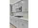Close up of a modern gas range and stainless steel microwave at 534 Four Seasons Blvd, Summerville, SC 29486