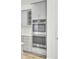 New stainless steel oven appliances with gray kitchen cabinets at 534 Four Seasons Blvd, Summerville, SC 29486