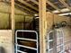 An interior of the barn, which features wooden framing, and several tools and storage spaces at 5354 Ceva Dr, Hollywood, SC 29449