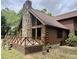Beautiful home with a stone chimney, deck, and well-maintained exterior at 5354 Ceva Dr, Hollywood, SC 29449