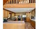 Kitchen with stainless steel appliances, natural wood cabinets, and an island at 5354 Ceva Dr, Hollywood, SC 29449
