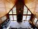 Living room with soaring ceilings, stone fireplace, and great natural light at 5354 Ceva Dr, Hollywood, SC 29449
