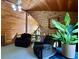 Spacious loft featuring wood paneling, high ceilings, and plush seating at 5354 Ceva Dr, Hollywood, SC 29449