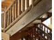 Unique staircase featuring log-style construction, adding rustic charm to the interior at 5354 Ceva Dr, Hollywood, SC 29449