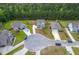An aerial view showcasing the home's prime location within a cul-de-sac and its spacious, landscaped yard in a friendly neighborhood at 5497 Alpine Dr, Summerville, SC 29483