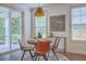 Charming dining area with stylish table, seating, and ample natural light at 5497 Alpine Dr, Summerville, SC 29483