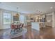 Open kitchen and dining area featuring modern appliances and island seating at 5497 Alpine Dr, Summerville, SC 29483
