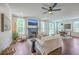 Bright, open living room with fireplace, hardwood floors, and stylish furnishings at 5497 Alpine Dr, Summerville, SC 29483