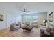 Spacious living room features light wood flooring and neutral furniture at 5497 Alpine Dr, Summerville, SC 29483