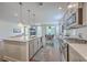 Open concept living space combining the kitchen, dining, and living areas at 5497 Alpine Dr, Summerville, SC 29483