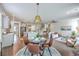 Spacious open floor plan showcases the kitchen, dining area, and living room at 5497 Alpine Dr, Summerville, SC 29483
