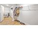 Spacious walk-in closet with wire shelving, wood floors, and clothing/shoes neatly arranged at 5497 Alpine Dr, Summerville, SC 29483