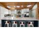 Bright kitchen with a large island, counter seating, and stainless steel appliances at 5653 Wire Rd, Branchville, SC 29432