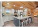 Beautiful kitchen with a large island, white cabinetry, and modern appliances at 5653 Wire Rd, Branchville, SC 29432