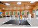 Spacious kitchen features a stainless steel sink and granite countertops with wood paneling at 5653 Wire Rd, Branchville, SC 29432