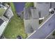 Aerial view showcases rooftops, paved roads and lush landscaping near a community pond at 5911 Steward St # 24, Hanahan, SC 29410