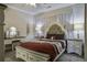 Comfortable bedroom featuring decoratively designed bed, bedside tables and vanity table at 5911 Steward St # 24, Hanahan, SC 29410